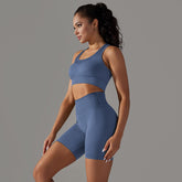 Nahtloser gestrickter hoher Taillen-Bauch-Kontraktur-Übungs-Yoga-Trainings-BH-Weste-Shorts-Strumpfhosen-Anzug